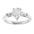 The Cassandra 1.40ctw Pear and Baguette cut Lab Grown Diamond Trilogy Engagement Ring