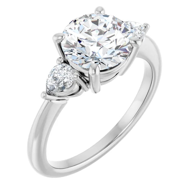 The Isla 2.40ctw Round and Pear cut Lab Grown Diamond Trilogy Engagement Ring