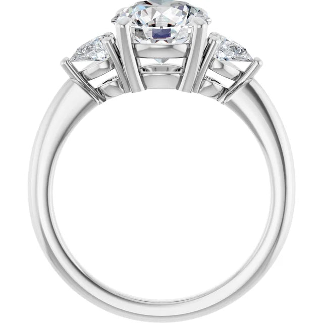 The Isla 2.40ctw Round and Pear cut Lab Grown Diamond Trilogy Engagement Ring