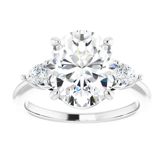 The Isla 3.40ctw Oval and Pear cut Lab Grown Diamond Trilogy Engagement Ring