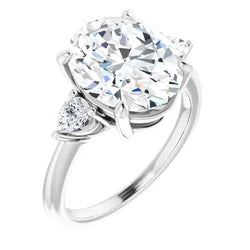 The Isla 4.40ctw Oval and Pear cut Lab Grown Diamond Trilogy Engagement Ring